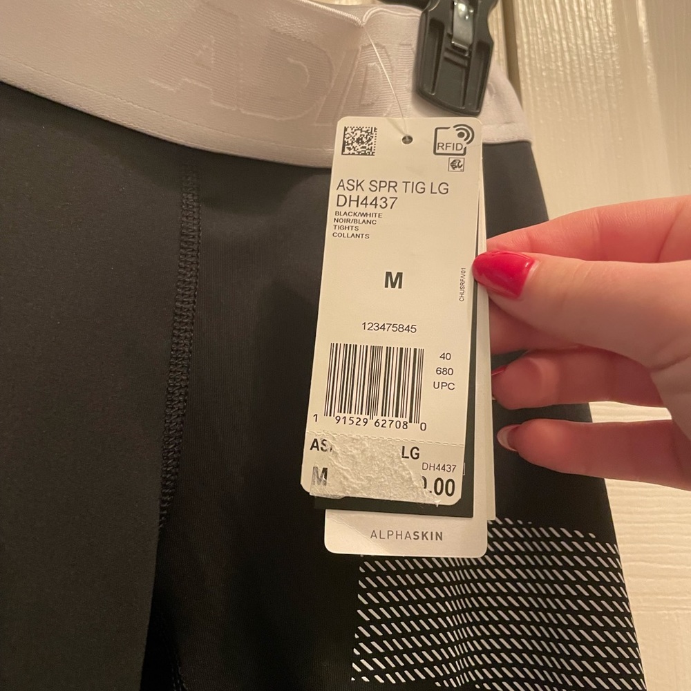 Women’s Adidas Alphaskin leggings with Logo size medium with tags